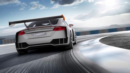 Sleek Audi TT Racing on a Curved Track wallpaper