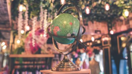 Elegant Globe in a Charming Setting wallpaper