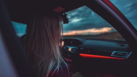 Sunset Drive Serenity in a Car Interior Scene wallpaper