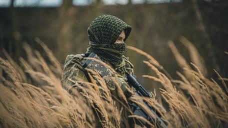 Sniper Hidden in Tall Grass wallpaper
