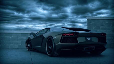 Majestic Lamborghini Aventador Under Stormy Skies wallpaper