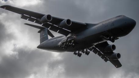 Majestic Military Transport Aircraft in Flight wallpaper