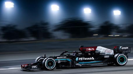 Speeding Mercedes F1 Car Night Race wallpaper