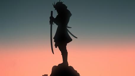 Warrior's Silhouette Against Twilight Sky wallpaper