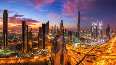 Time lapse photo of the Burj Khalifa and the Sheikh Zayed Road wallpaper
