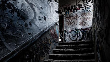 Urban Graffiti Staircase in Shadows wallpaper