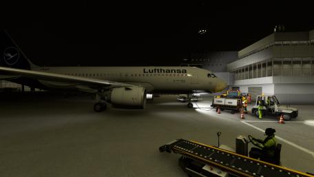 Nighttime Aircraft Operations at an Airport Ground wallpaper