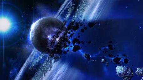 Planet Amidst Asteroid Belt in Blue Space wallpaper