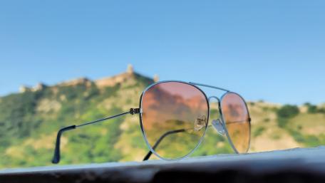 Nature Through Stylish Glasses Frame the World Ahead wallpaper