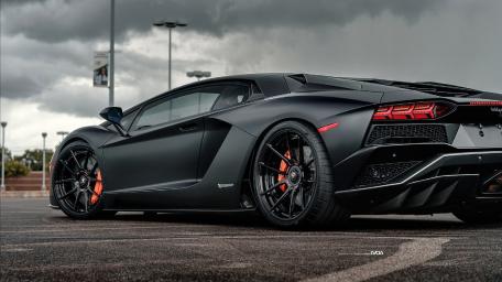 Sleek Matte Black Lamborghini Aventador S Wallpaper wallpaper