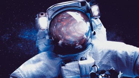 Astronaut Gliding Through the Cosmic Abyss wallpaper