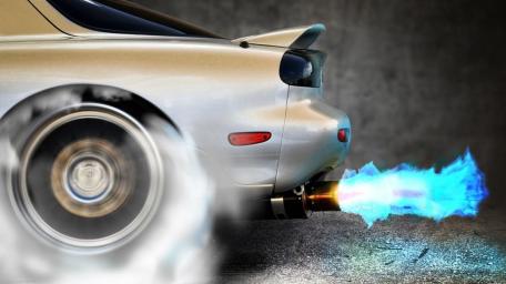 Vivid Racing Flames and Smoke Wallpaper wallpaper