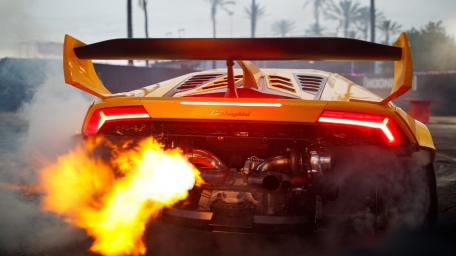 Lamborghini Flames Igniting the Street Scene wallpaper