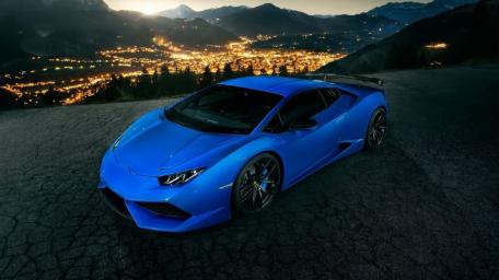 Sleek Blue Lamborghini Huracan Night Drive Scene wallpaper