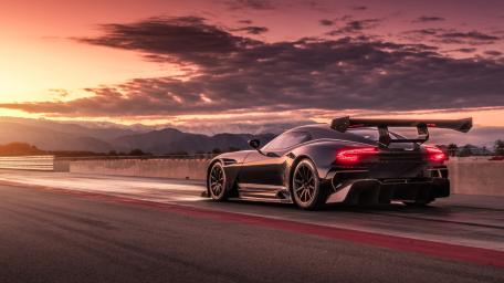Sleek Aston Martin Vulcan Against a Stunning Sunset wallpaper