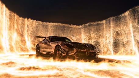 Blazing Speed in a Fiery Arena wallpaper