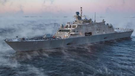 Majestic U.S. Navy Ship in Chilly Waters wallpaper