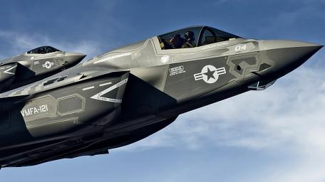 Sleek Stealth Fighter in Action wallpaper
