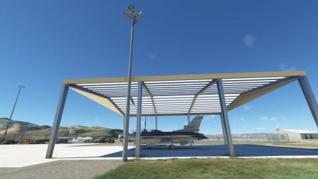 Air Force Aircraft Under Shelter in Daylight wallpaper