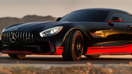 Sleek Black Mercedes with Striking Red Accents wallpaper