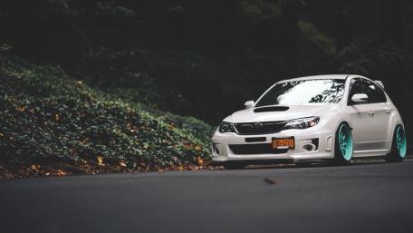 Sleek Subaru Impreza in a Natural Environment wallpaper