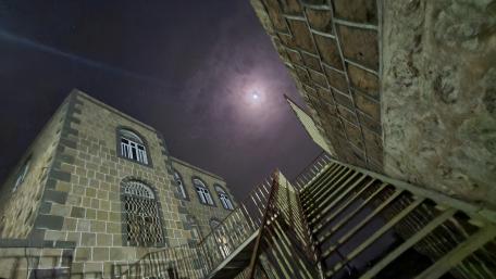 Moonlit Shadows of a City Home wallpaper