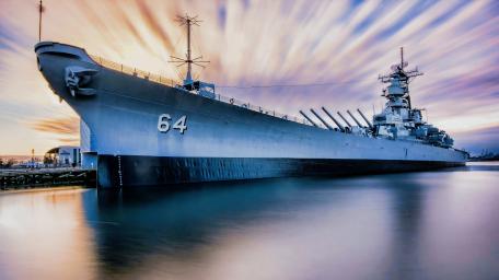 Battleship at Dawn: Majestic Strength of the Seas wallpaper