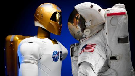Futuristic Robonaut and Astronaut Encounter in Space wallpaper
