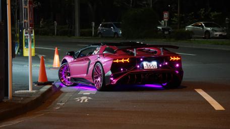 Lamborghini's Night Prowl in Neon Lights wallpaper