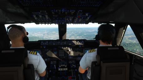 Cockpit View of Airplane Pilots in Action wallpaper