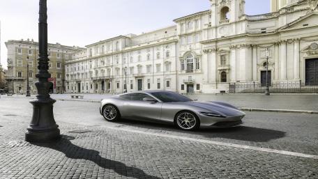 Sleek Elegance of the Ferrari Roma on Cobblestones wallpaper