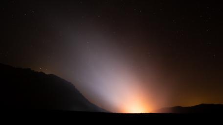 Serene Nightscape with Distant Glow wallpaper