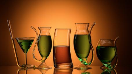 Vibrant Glassware Display with Unique Shapes and Colors wallpaper
