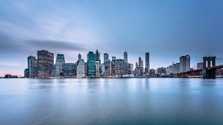 Body of Water Near City Buildings wallpaper