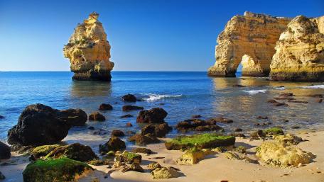 Serene Summer Sea Stack Scene wallpaper
