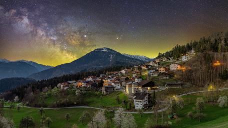 Serene Village Under the Milky Way Night Sky wallpaper