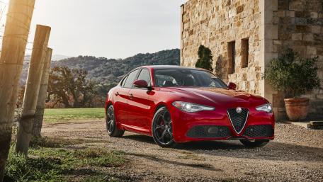 Elegant Alfa Romeo Giulia in Stunning Landscape View wallpaper