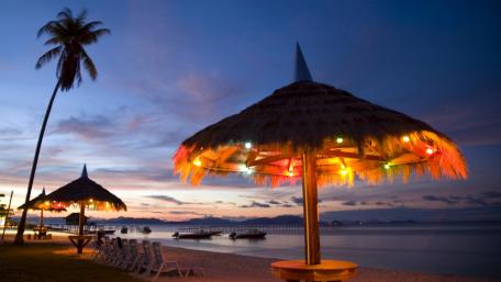 Serene Beach Hut at Dusk wallpaper