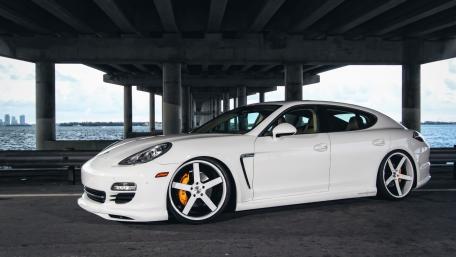 Sleek White Porsche Panamera Under a Bridge wallpaper