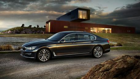 Sleek BMW Luxury Sedan in Scenic Setting wallpaper