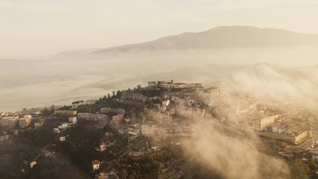 Misty Morning Over a Cityscape wallpaper