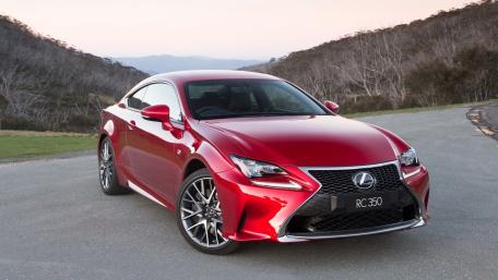 Sleek Red Lexus RC 350 on Scenic Roadway wallpaper