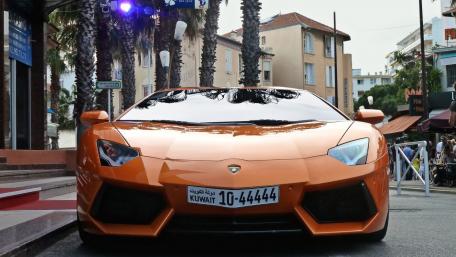 Dynamic Lamborghini Aventador in Urban Setting wallpaper