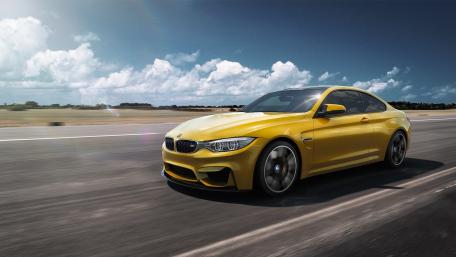 Dynamic BMW M4 on the Open Road wallpaper