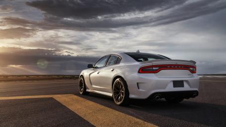 Sleek Dodge Charger Under Dramatic Skies wallpaper