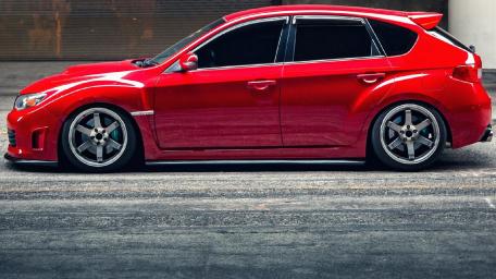 Sleek Red Subaru Hatchback Rockstar Look wallpaper