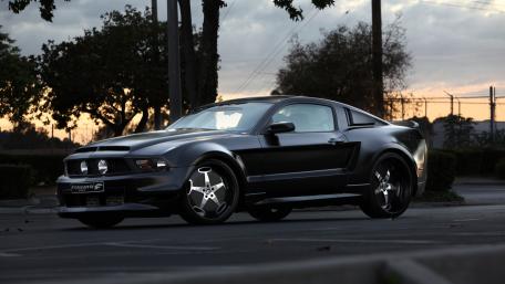 Sleek Ford Mustang GT in Sunset Glow wallpaper
