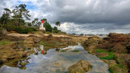 Tranquil Chapel Reflected in Nature's Serenity wallpaper