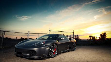Sleek Ferrari F430 in Stunning Sunset Backdrop wallpaper