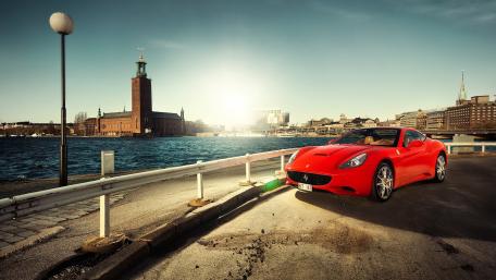 Sleek Red Beauty by the Water wallpaper